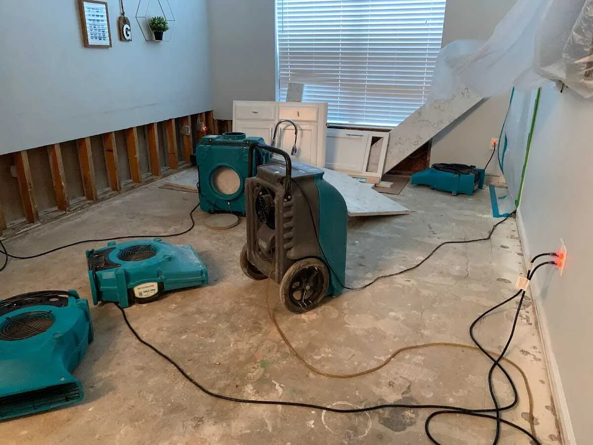 Dehumidifier in flood-cut room for Water Damage Restoration in Brier